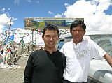 Tibet 08 02 Guide Jigmi and Driver Panchoul at Gyatso La Our Tibetan guide Jigmi and driver Panchoul pose in front of our Toyota Land Cruiser at the Gyatso La (5220m).